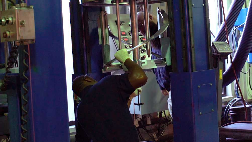 A Hockmeyer Service Rep working on a Helical blade replacement